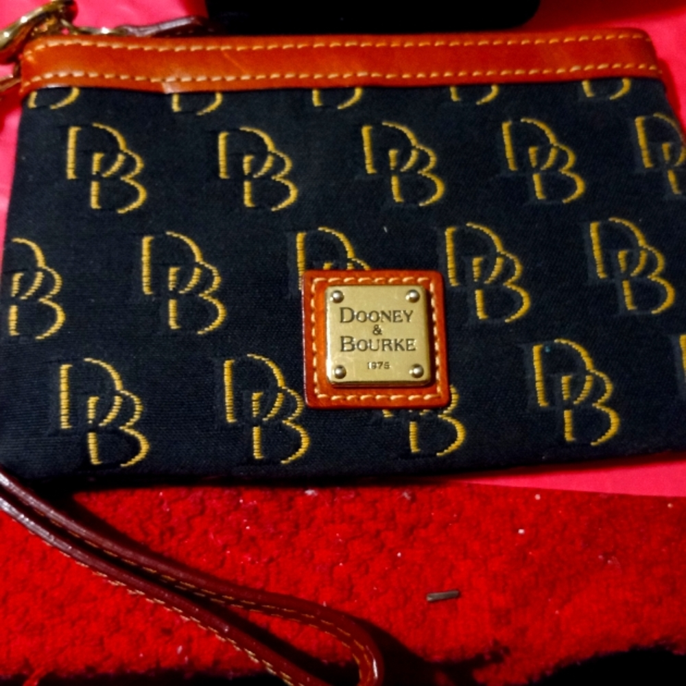 Dooney Burke slang Key chain minuture purse.